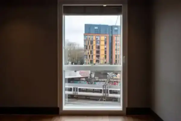 Discreet secondary glazing installation in a classic London period property, fitted flush inside original sash windows to preserve heritage character while boosting insulation.